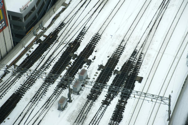 Railway lines in winter with snow melted around electrically heated points