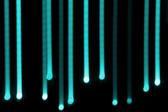 aquamarine coloured lines of light create a &#039;falling&#039; effect