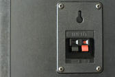 spring loaded audio connection terminals on the back of a hi-fi speaker cabinet