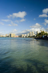 sunny day in a holiday paradise, waikiki beach honolulu, hawaii