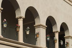 court yard in the spanish colonial style with arcade or decorative planters